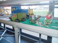 A picture of the cabinet showing many locomotives and a small spitfire. Also a Army Box Lorry